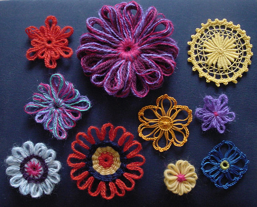A small collection of yarn flowers and simple teneriffe lace motifs