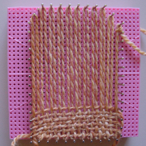 Weaving an arch shape.