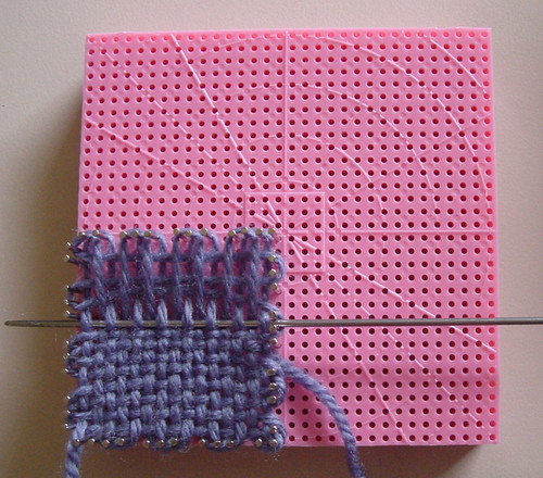 Weaving a small square using the three pin continuous method.