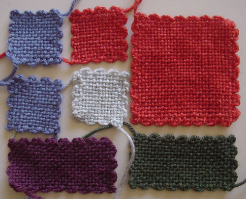 Different sized squares and rectangles that were woven using the three pin continuous method.