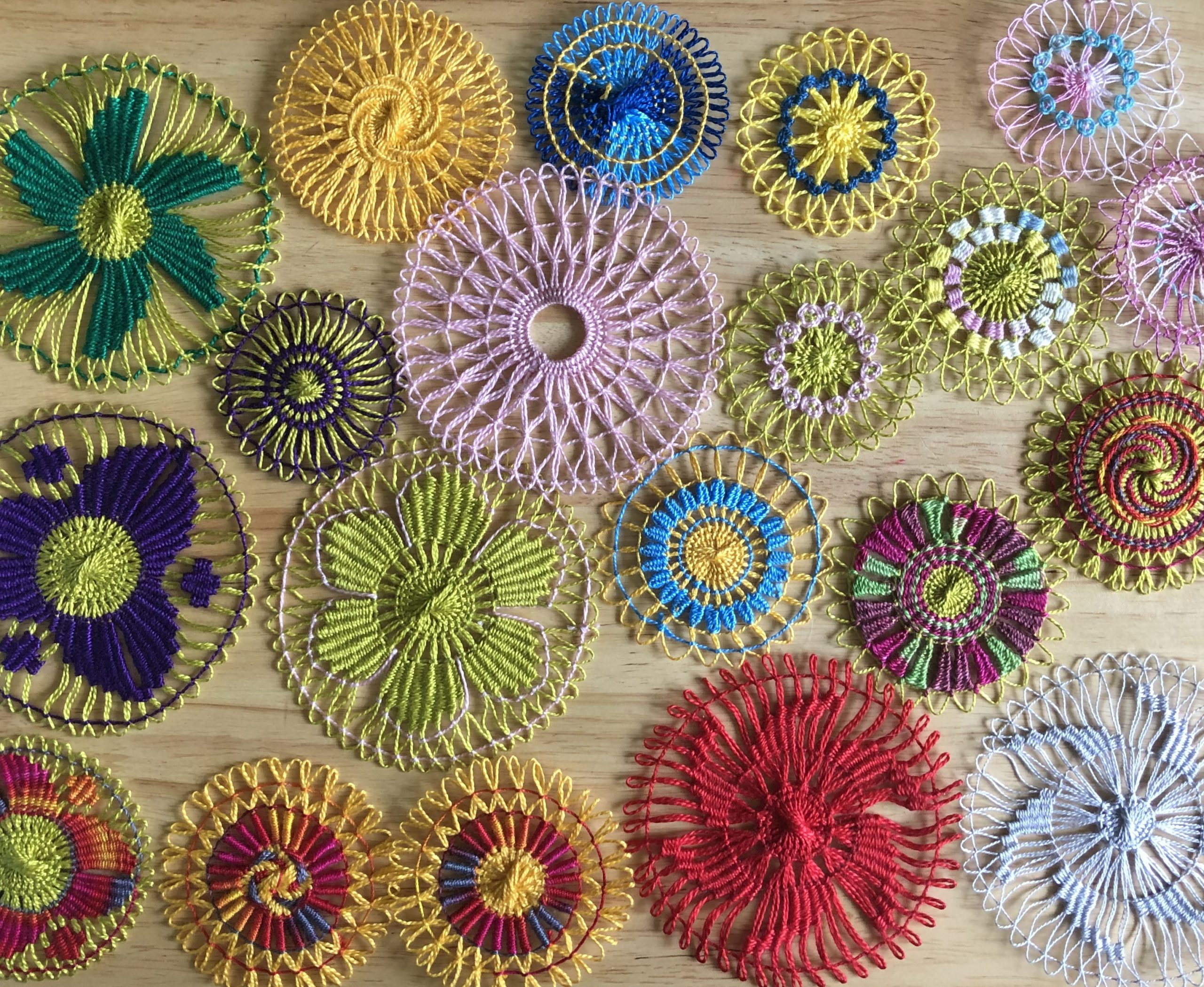 Brightly coloured teneriffe lace medallions