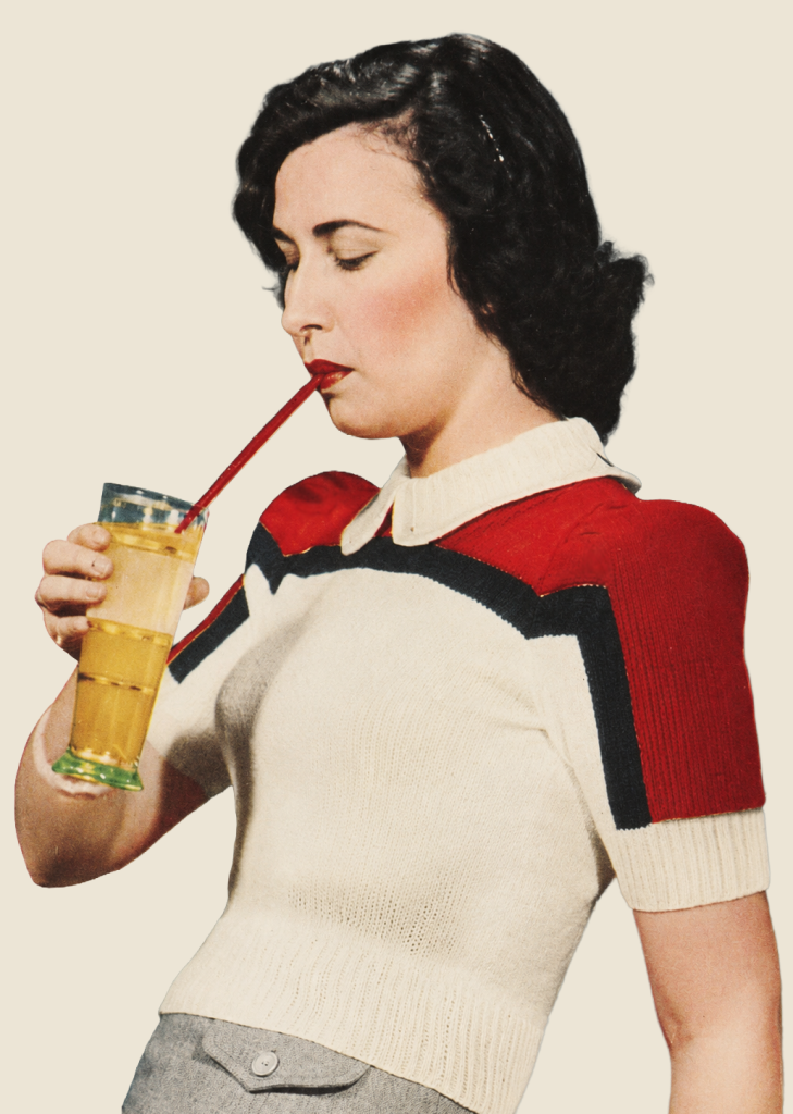 A white, form fitting sweater with short sleeves and slightly puffed shoulders. It has a thin blue stripe across the whole width of the body and sleeves, roughly level with the bottom of the neck opening. Above the blue stripe, the remainder of the sweater is red.