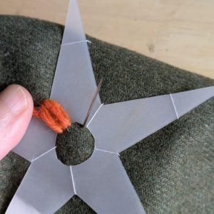 Moving the needle over for the next section of stitching.