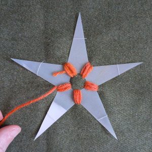 The first layer of stitching in the centre of the star is complete.
